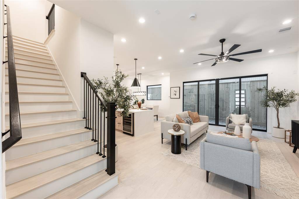 The stairway’s clean lines and modern materials contribute to the home’s overall architectural cohesion.