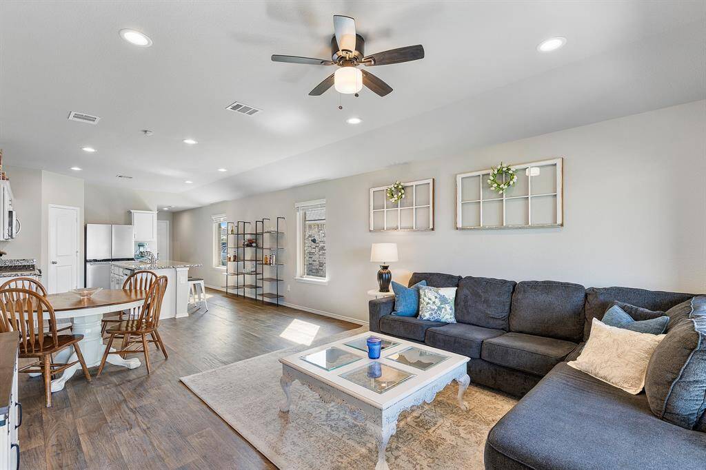 From stylish accents to plush seating, this open living area is perfect for everyday lounging or hosting guests.