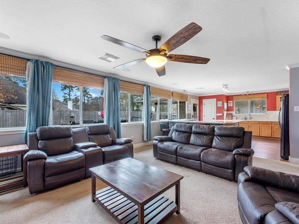 living room with ceiling fan .