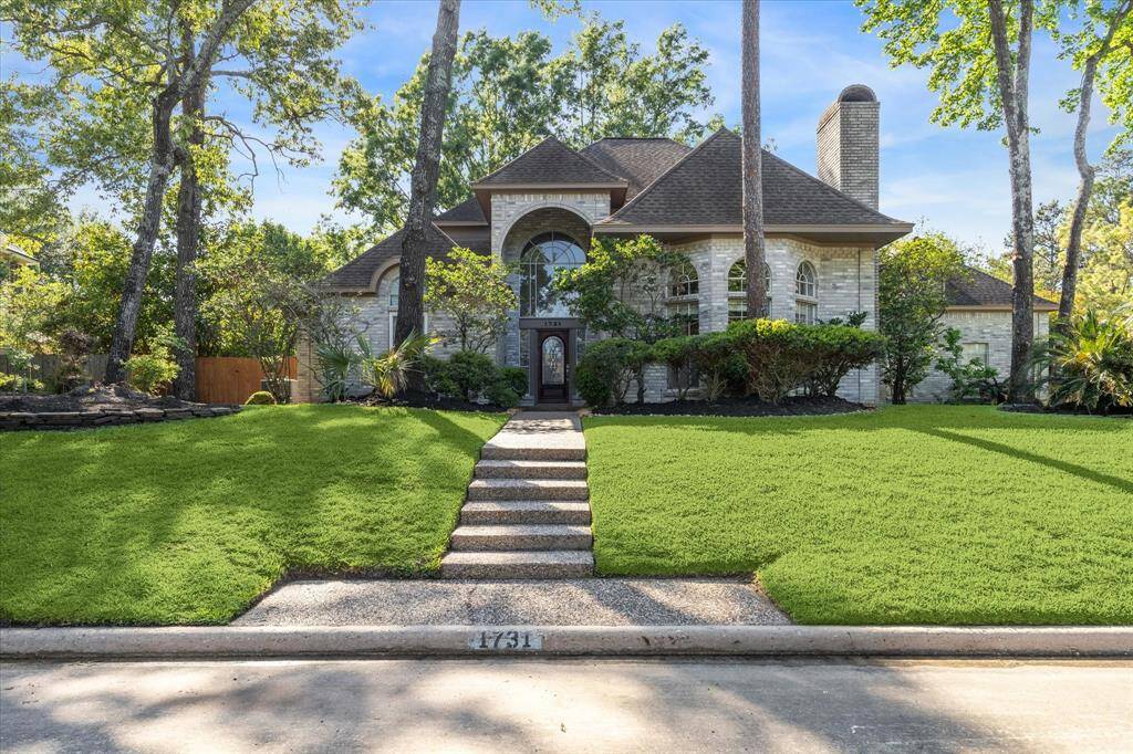 Custom George Weaver home on a large corner lot in the heart of Kings Point