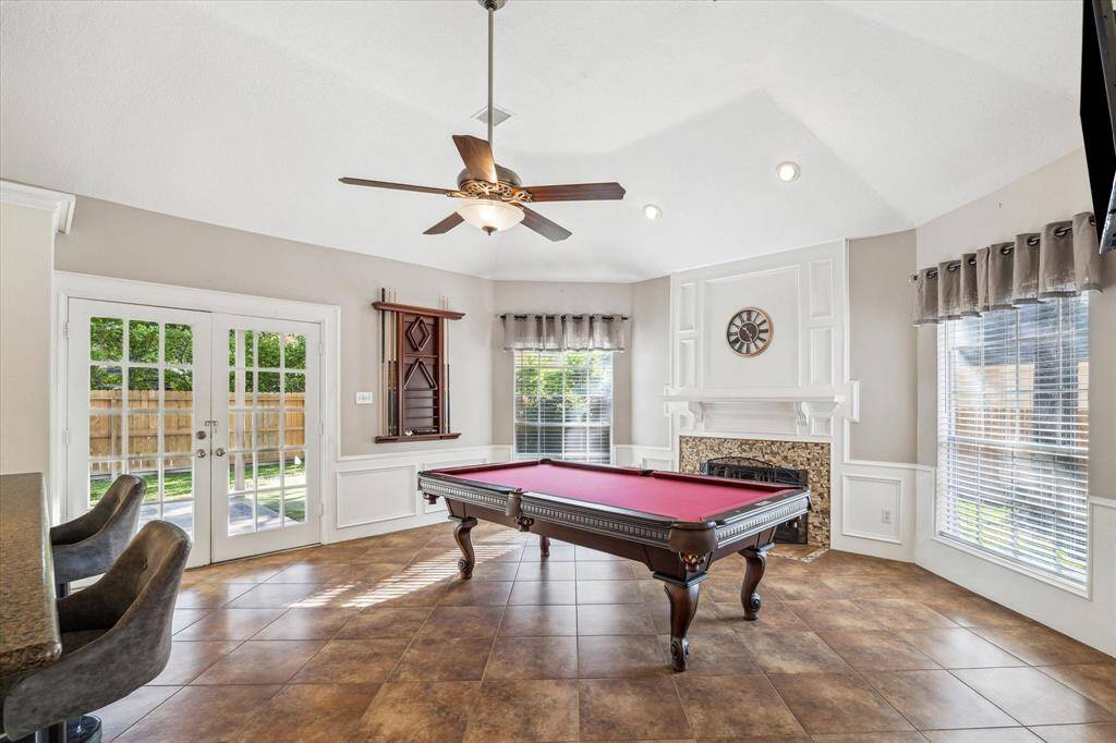 Family room with view and access out to the beautiful backyard.