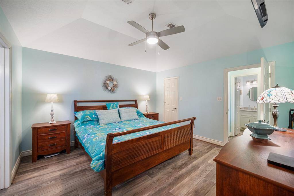 The primary bedroom offers convenient first-level access.
