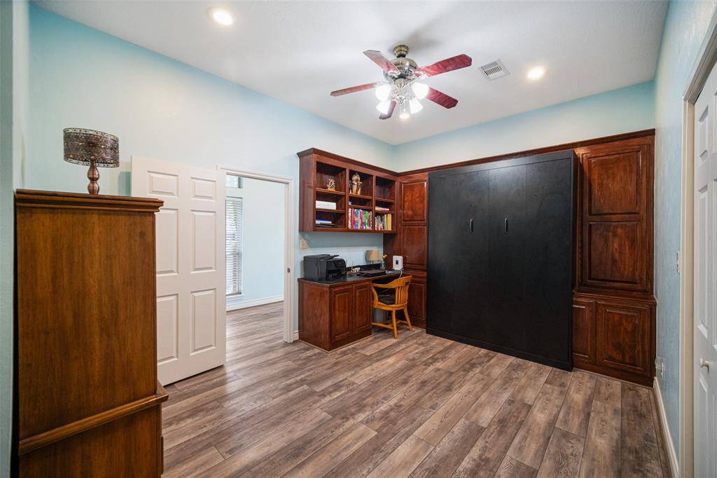 This versatile secondary bedroom also doubles as a stylish home office, offering flexibility to suit your lifestyle needs.