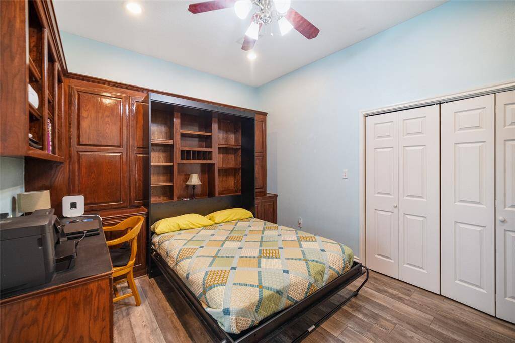View of the home office showcasing the Murphy Bed. Great utilization of space.