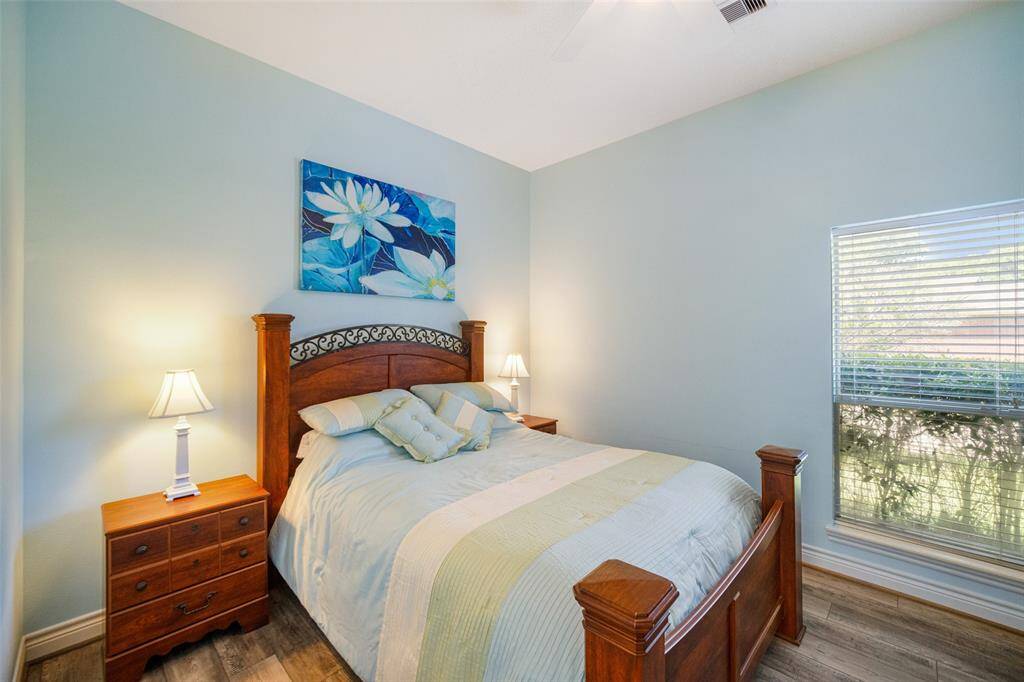 Secondary bedroom located on the first level at the back of the home.