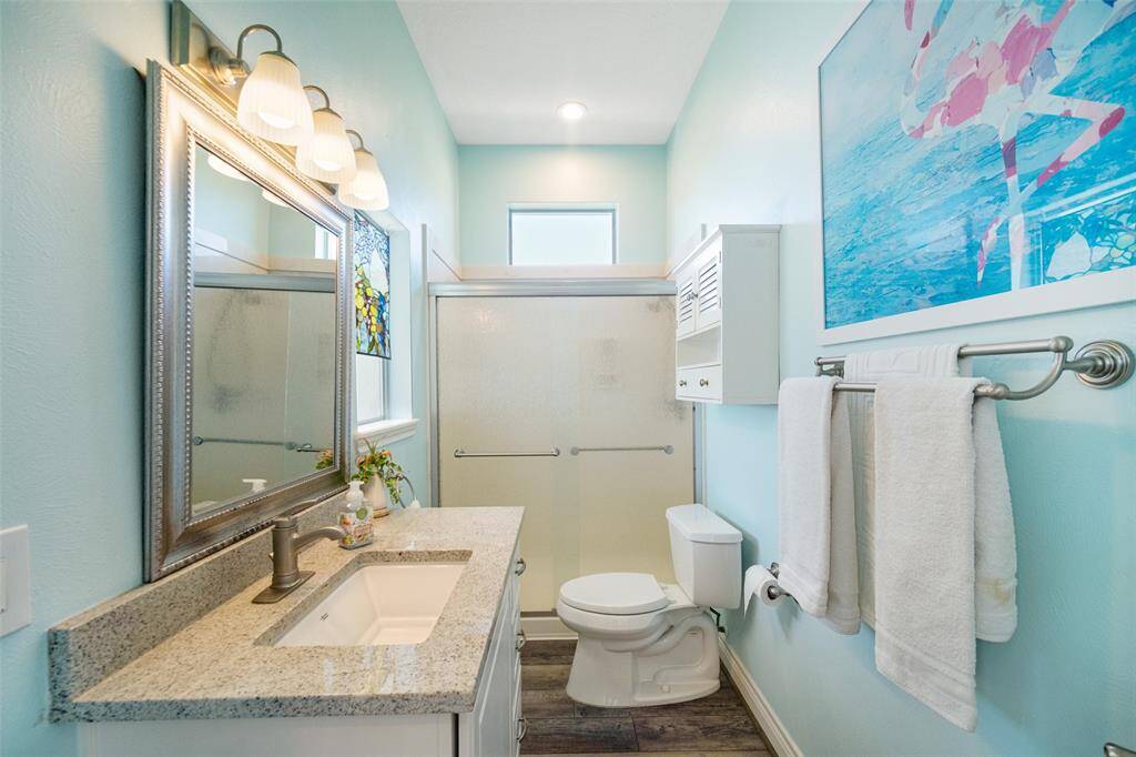 Full Bath located on the first level with easy access to Family Room and for guests.
