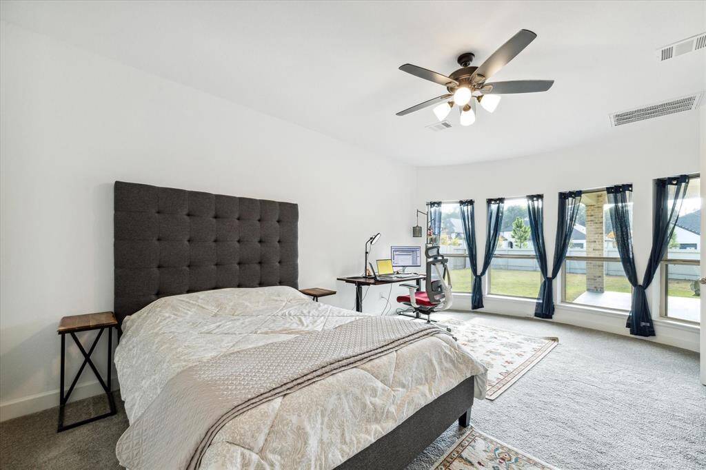 Step into the sanctuary of theprimary bedroom.