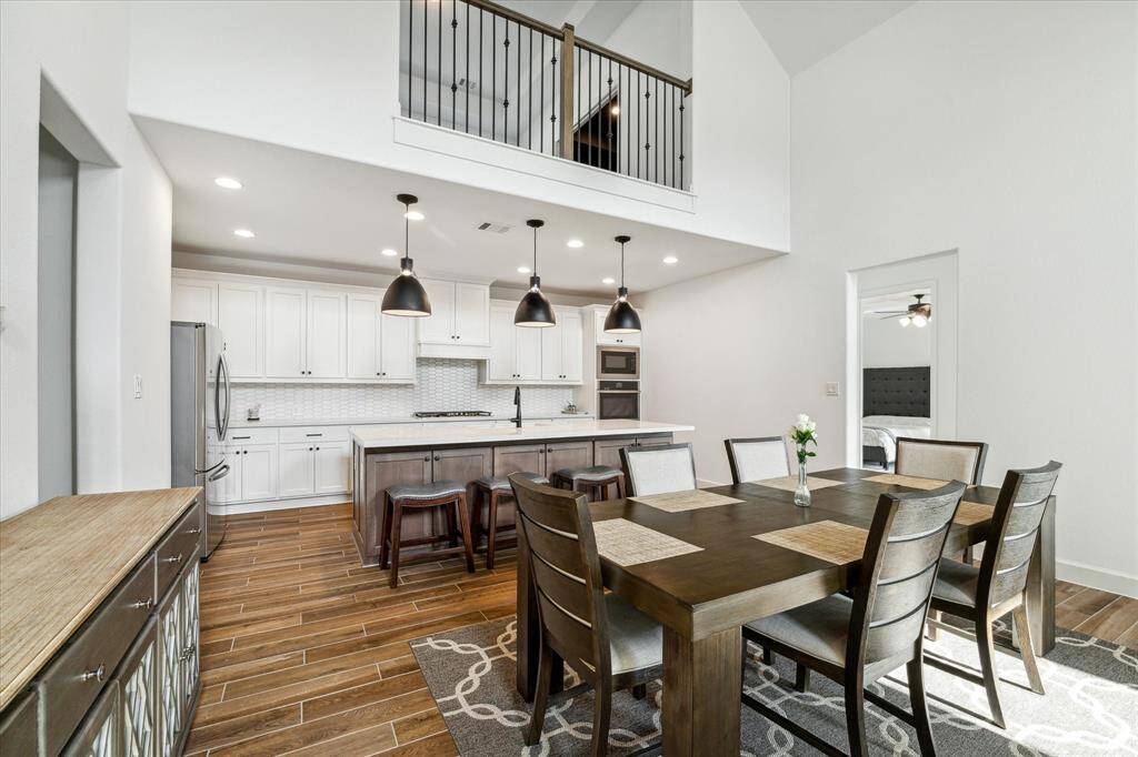 The room is enhanced by beautiful flooring.