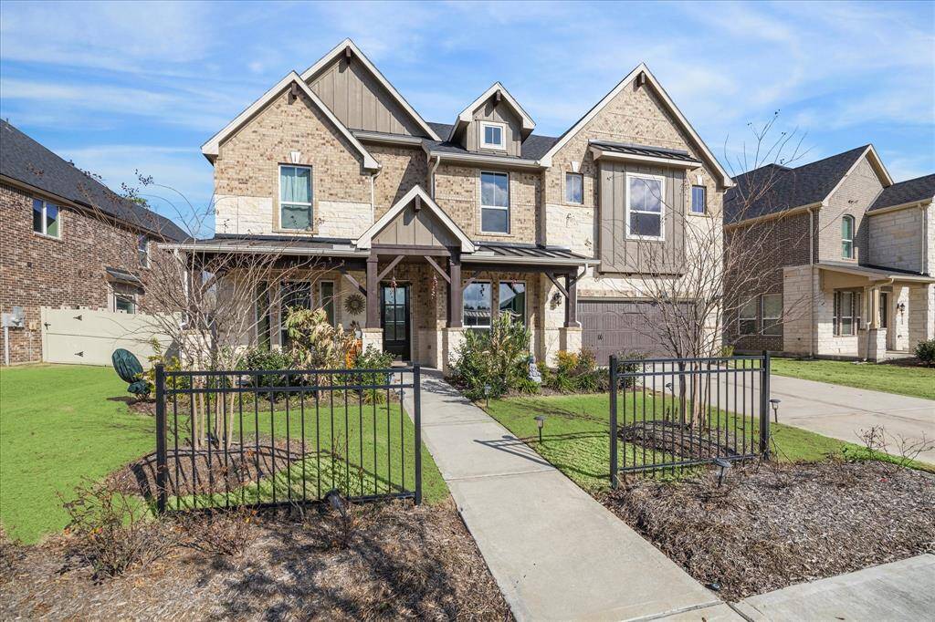 This stunning 5-bedroom, 4.5-bathroom home sits on a peaceful cul-de-sac in the prestigious Harper’s Preserve community, showcasing elegant brick and stone accents, a covered front porch, and a beautifully landscaped yard with wrought iron fencing. The spacious driveway and two-car garage add convenience, making this home as practical as it is charming.