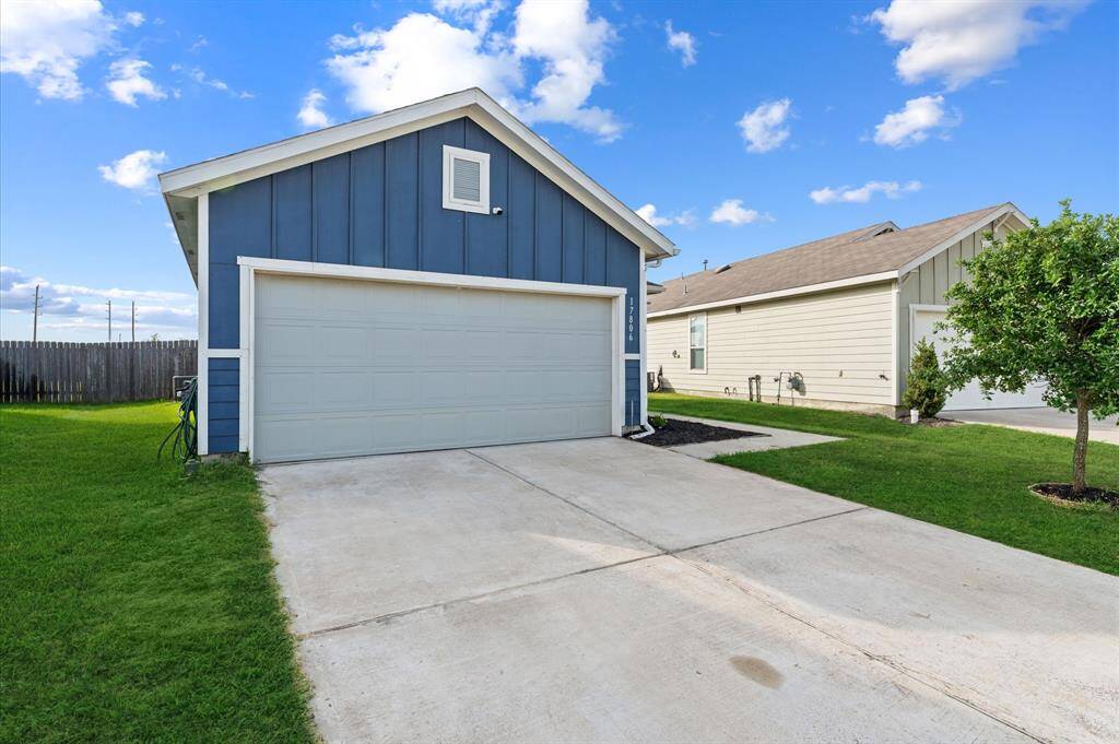 Another view of the front home with double driveway!