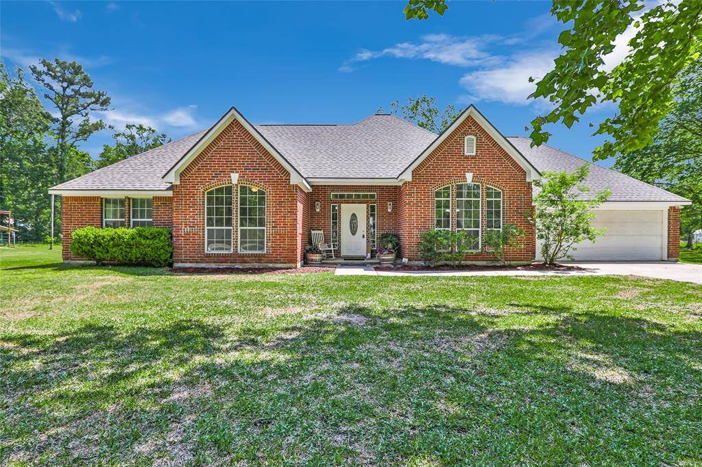 Welcome home! This charming 4-bedroom, 2-bath residence sits on a sprawling 1-acre lot with beautiful curb appeal and plenty of space to spread out.