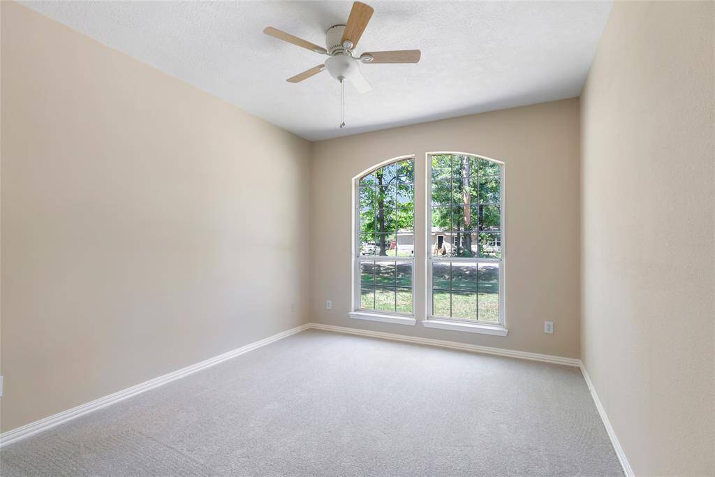 Each of the additional bedrooms offers generous closet space, natural light, and thoughtful architectural touches.