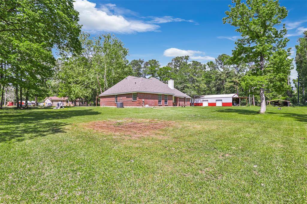 The expansive yard provides room for gardens, outdoor activities, or whatever your heart desires. It’s the perfect canvas for your dream outdoor retreat.