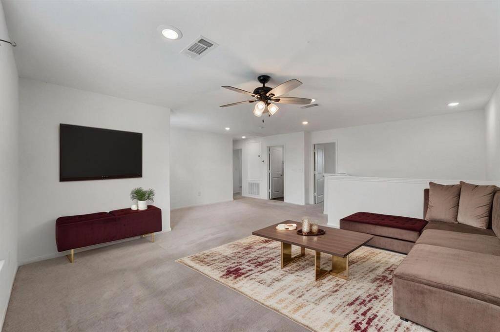 The game room is large and could fit any number of gaming set-ups. It could also be a great place for a pool table.