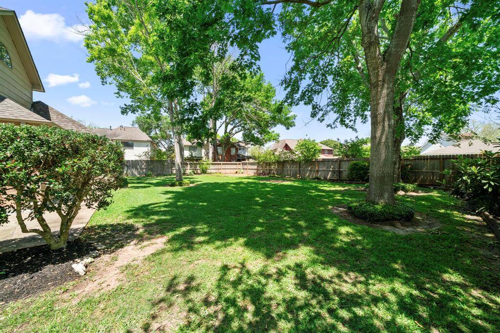 The many mature trees providing shade offer a serene outdoor space perfect for relaxation for your family or social gatherings.