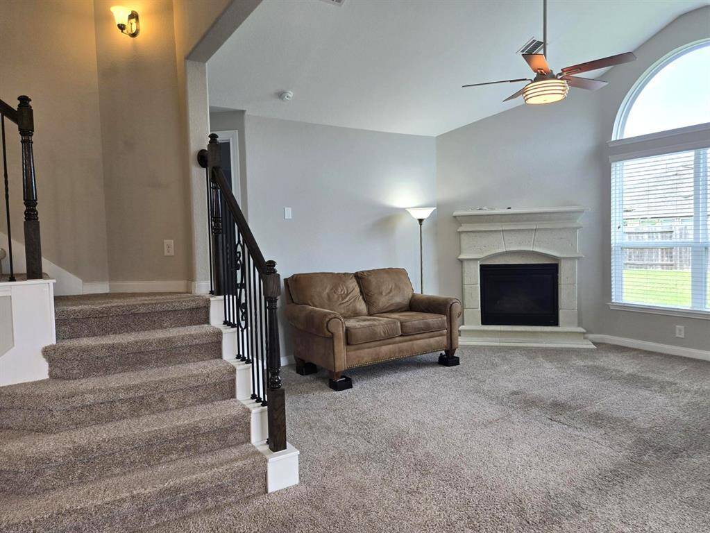 You will find a romantic fireplace with gas logs in the family room!