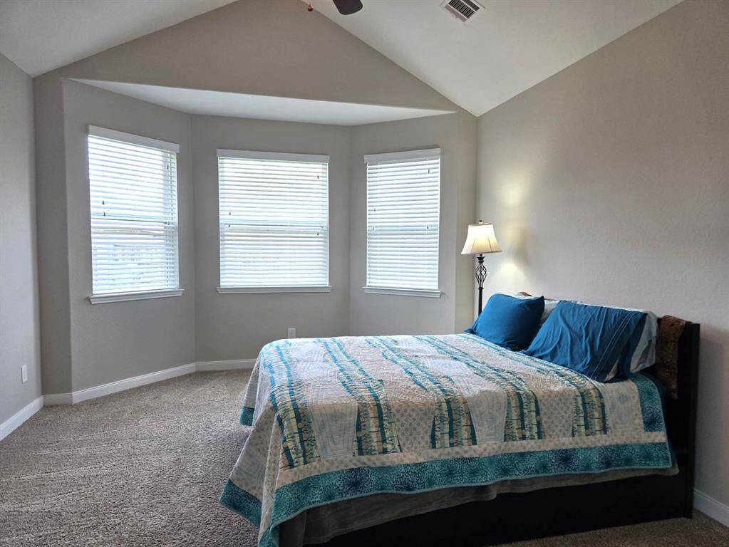 The main suite has a bay window for extra space! Notice the nice ceiling!