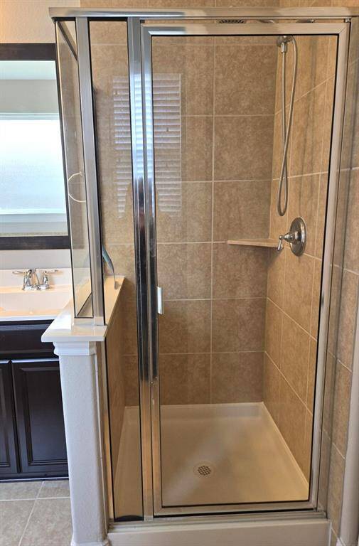 Separate shower in main bathroom.