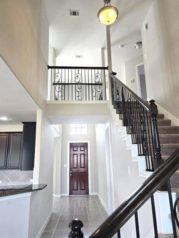 Great neutral color combination throughout allows for a serene feeling in this wonderful residence!