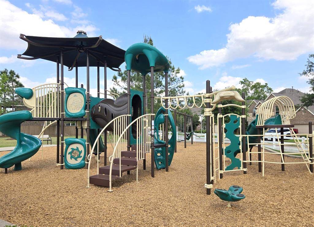 More fun for the kids!  Great playground in subdivision!