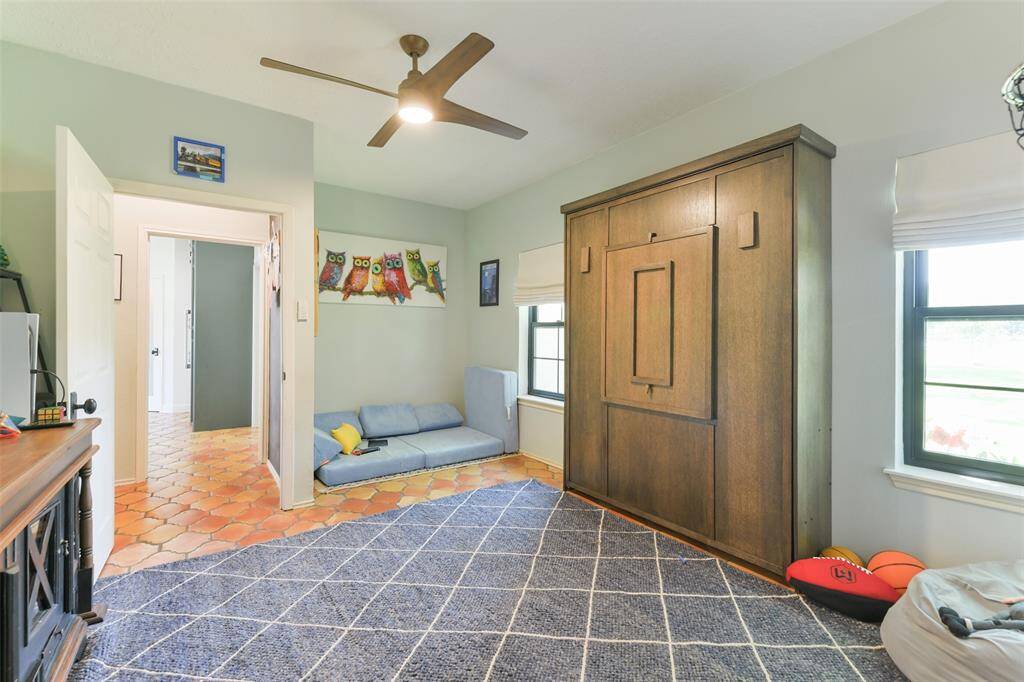 Another view of the Flex Room downstairs that could serve as a gym, 4th bedroom, game room...so much potential.