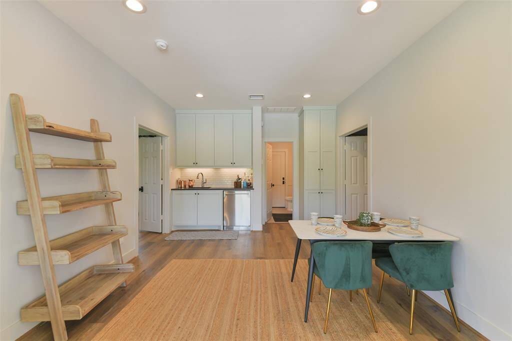 Guest House Living area and kitchenette includes a bedroom on either side and a full bathroom.