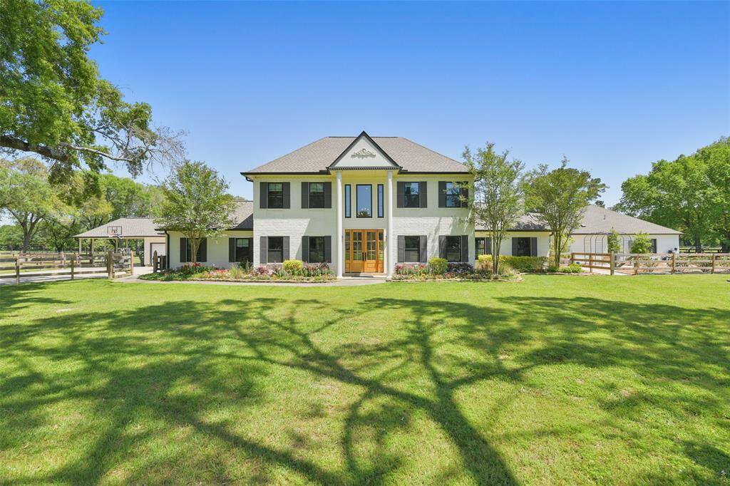 Large front yard provides peace and quiet from the private neighborhood street. New roof 2024 and exterior painted in 2020.