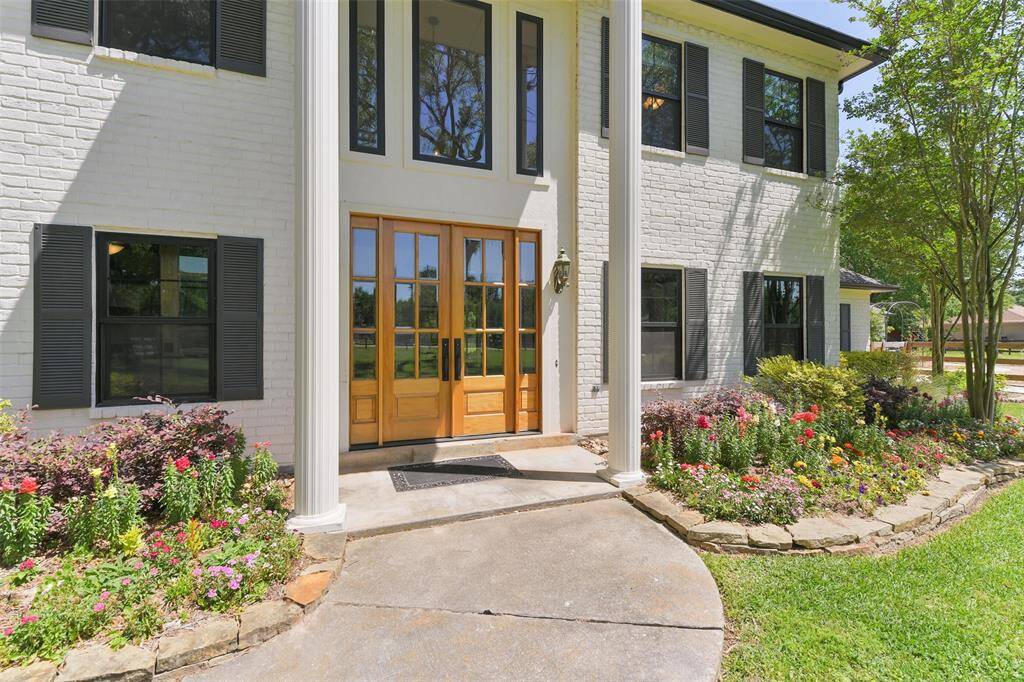Large double wood doors, new Anderson windows, and fresh paint are but a few upgrades within the last few years.
