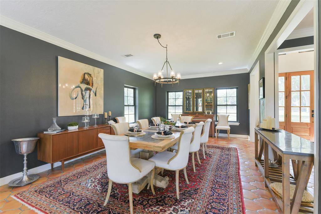 Freshly painted with crown molding and lots of natural light provide the perfect Dining Room setting.