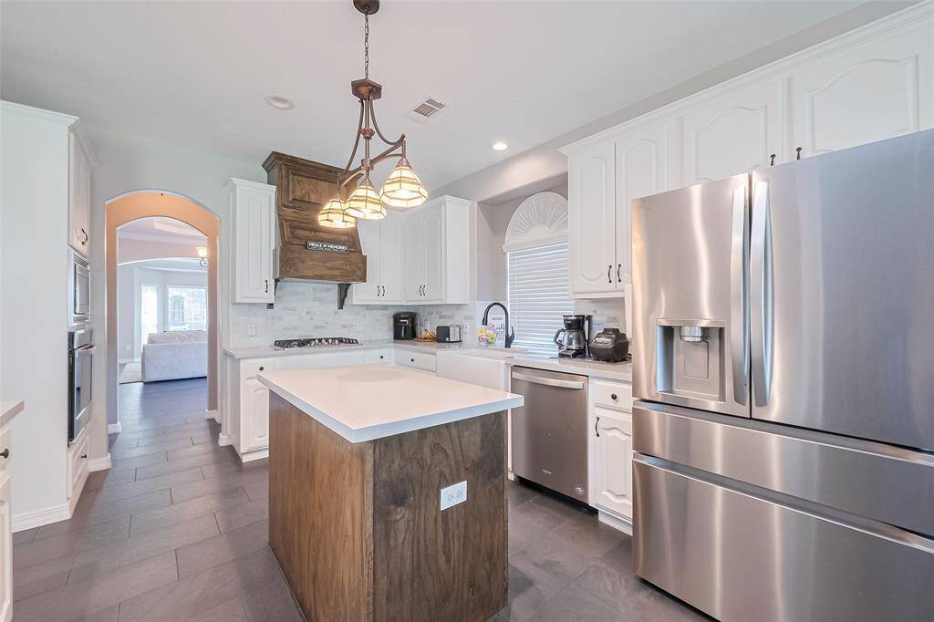 Butler pantry with ample storage.