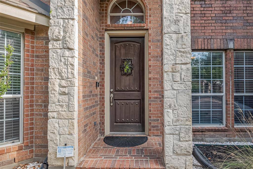 Step through this beautiful front door.