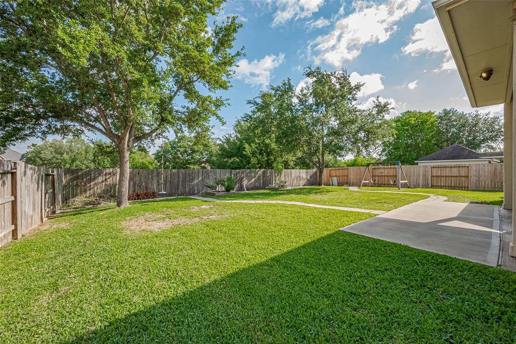 Beautiful, lush backyard with no back neighbors and backs up to a greenbelt.