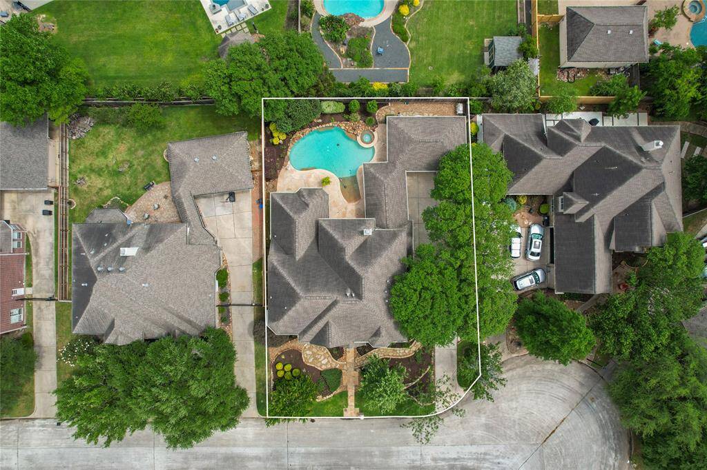 Endless possibilities await in this expansive property. Imagine the lifestyle this home offers: a sprawling house with a beautiful swimming pool, surrounded by a meticulously landscaped yard, all within a private, peaceful community.