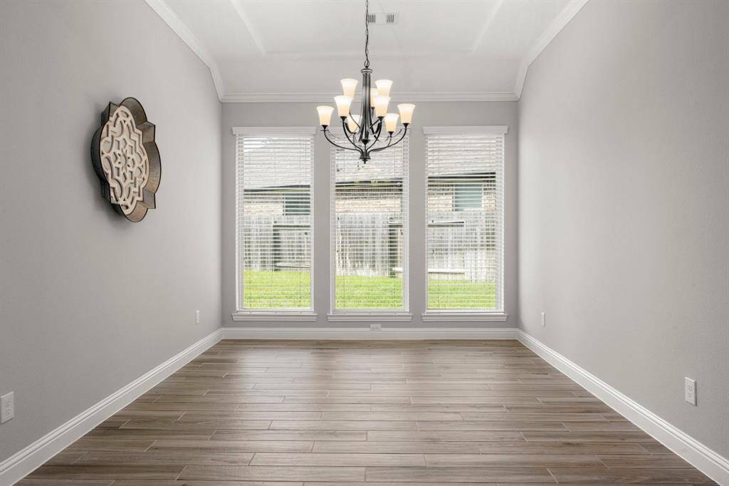 Formal dining room across from the kitchen.