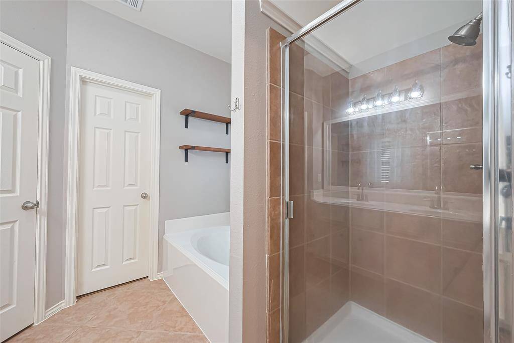 Primary bath with separate shower and garden tub