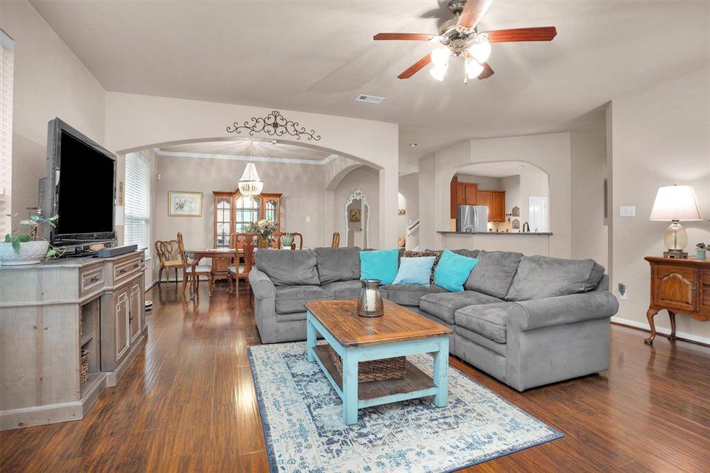 Seamless flow from the family room to the elegant dining area.