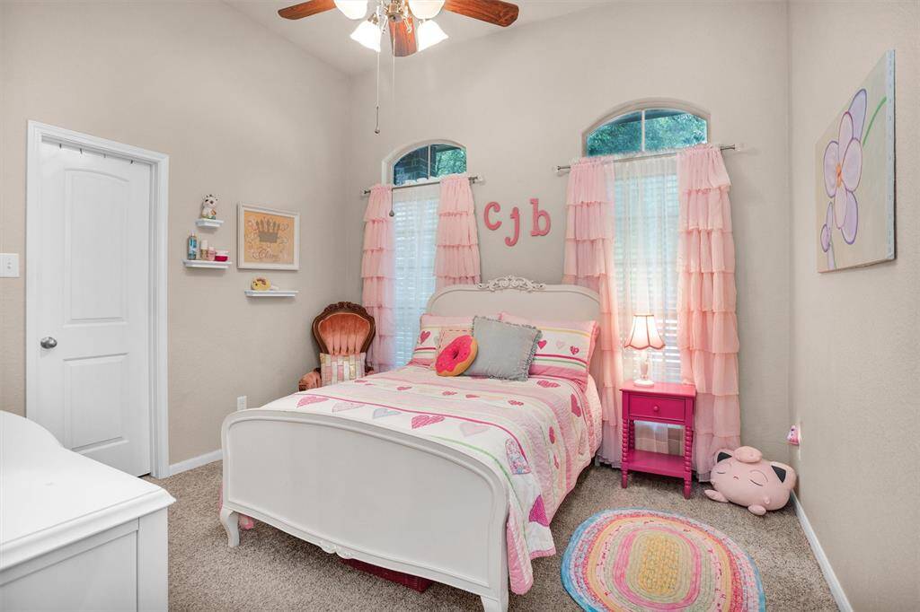 One of three  downstairs bedrooms.