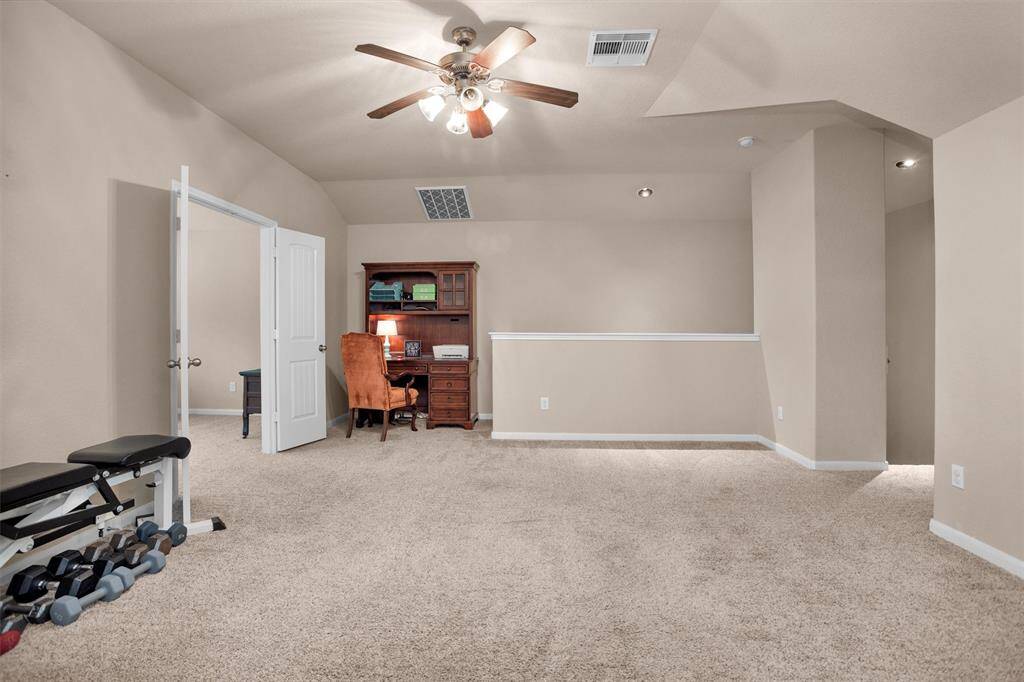 Spacious gameroom perfect for entertainment and relaxation.