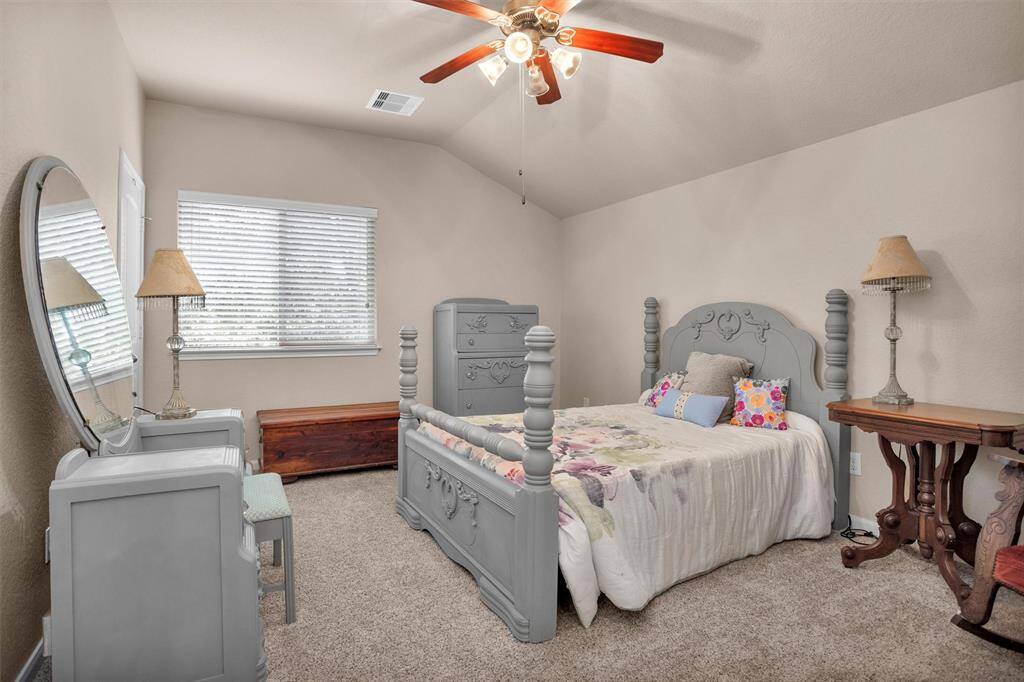Spacious upstairs 4th bedroom, perfect for guests or a home office.