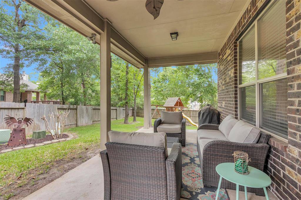 Relax and entertain on the inviting covered back patio, perfect for enjoying the outdoors year-round.