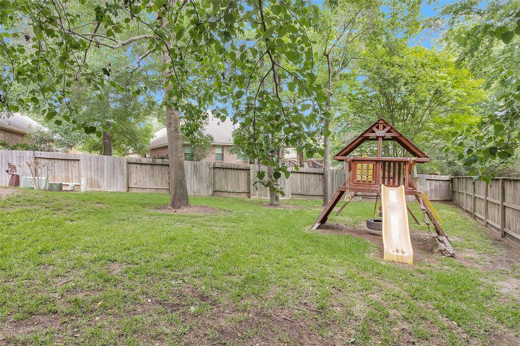 This charming wooden playset is included with the home.