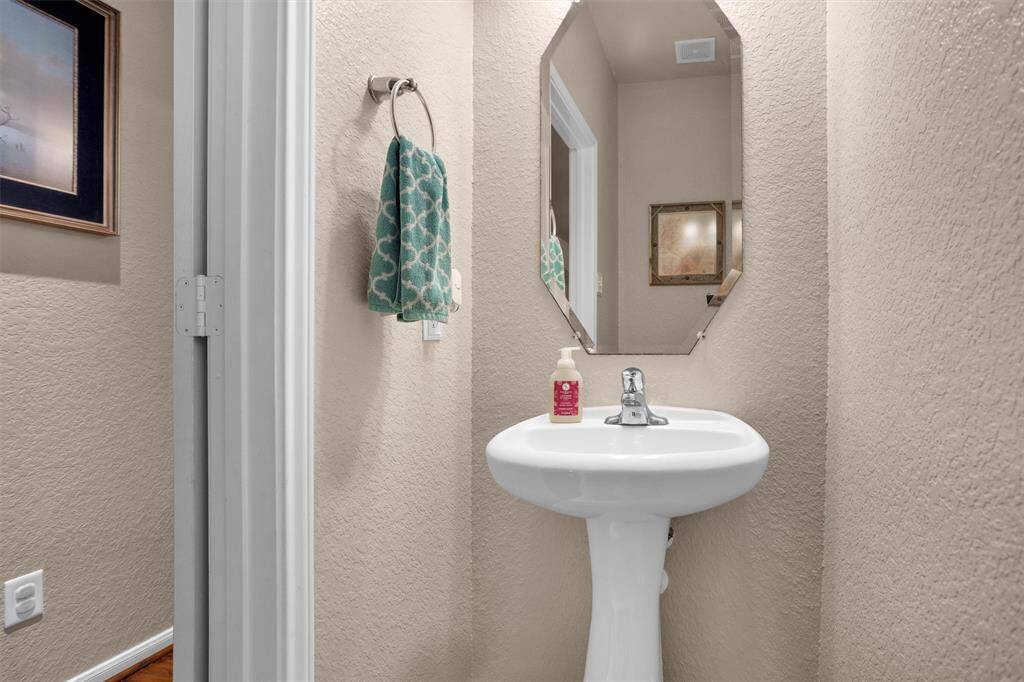 Cozy and convenient half bath perfect for guests.