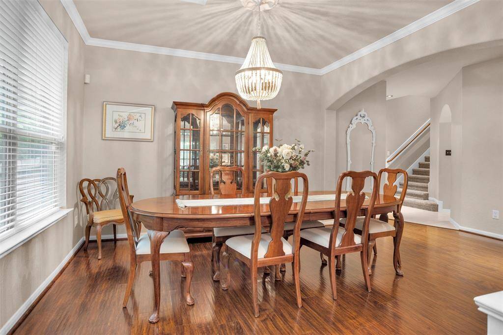 Spacious dining room perfect for hosting memorable gatherings.