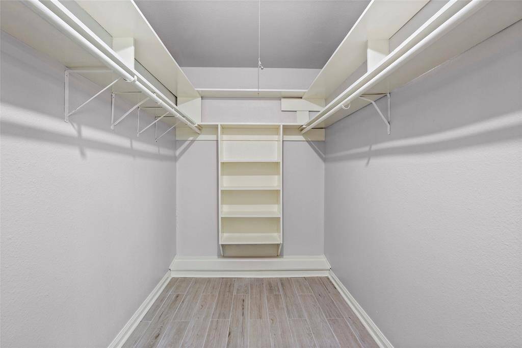 Primary walk-in closet.