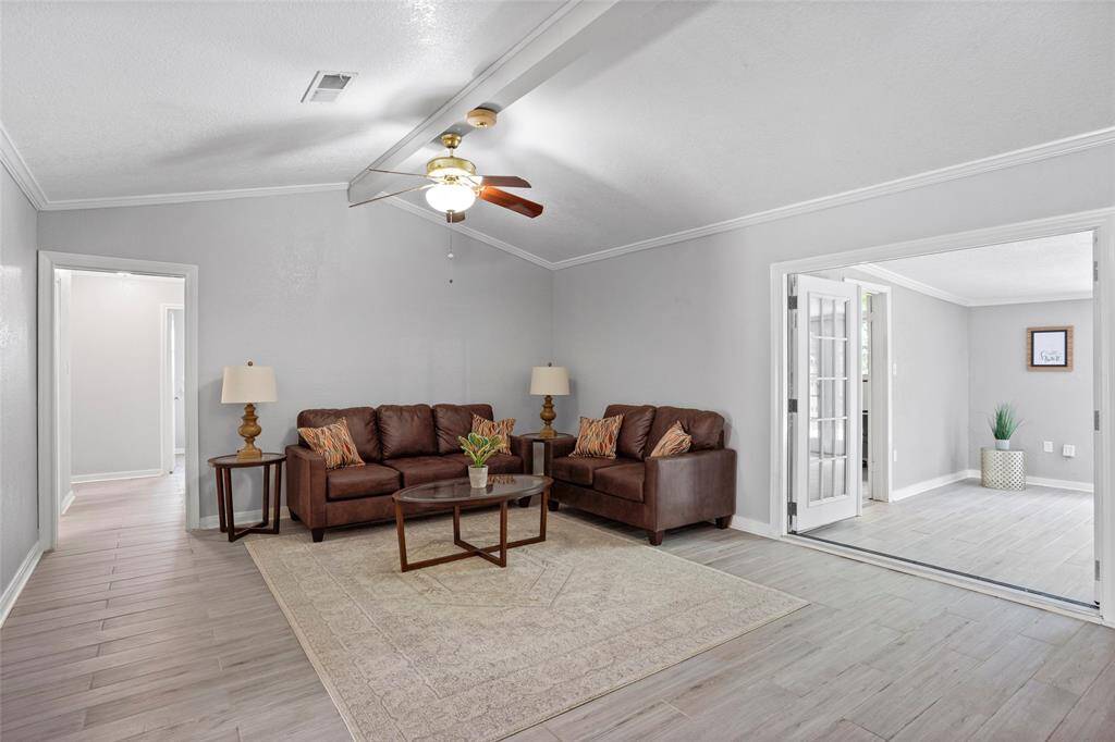 Great wall space and furniture can be staged many ways.