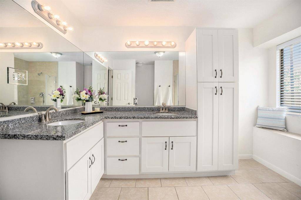 The master bathroom offer an abundance of storage, a double vanity.