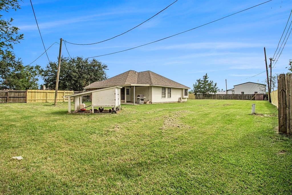The back yard is amazing. The chicken coop does not convey with the sale.
