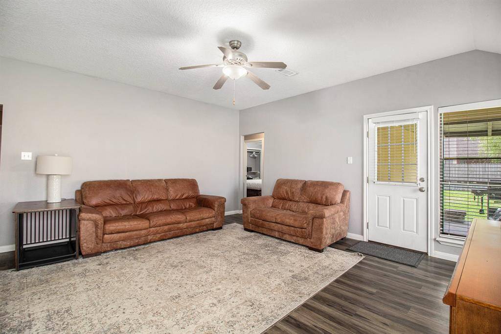 From the living area, you have easy access to the 2 bedrooms and hallway bath and to the outside patio.