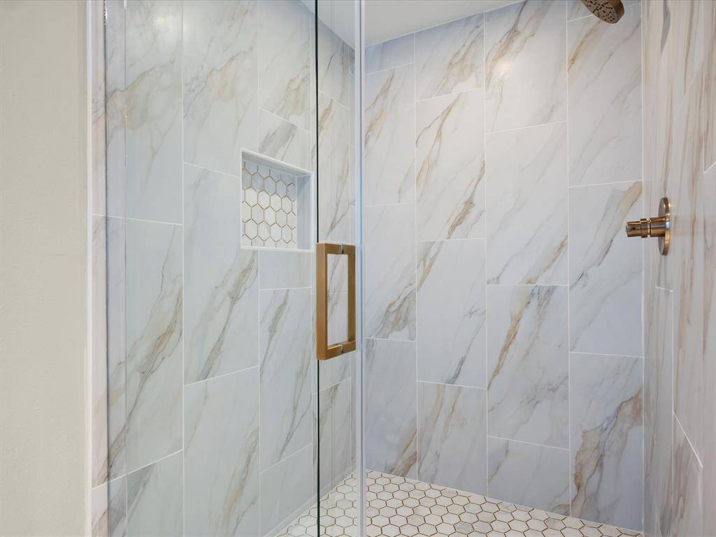 Enlarged Shower, With High End Tile, Faucet & Sliding Glass Door