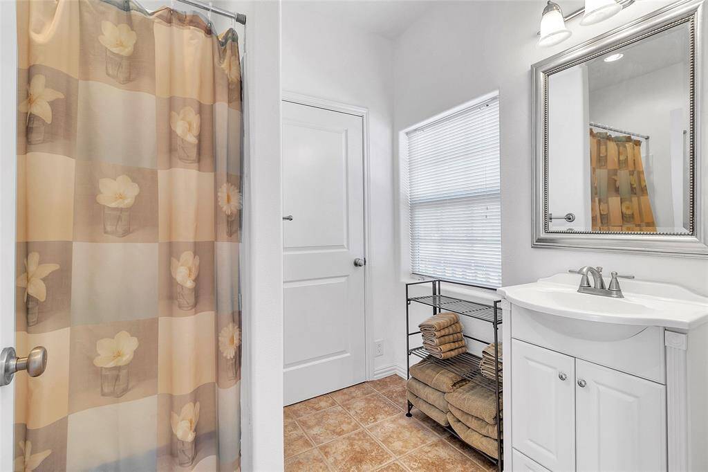 Hallway Full Tub/Shower Bath and Utility Room